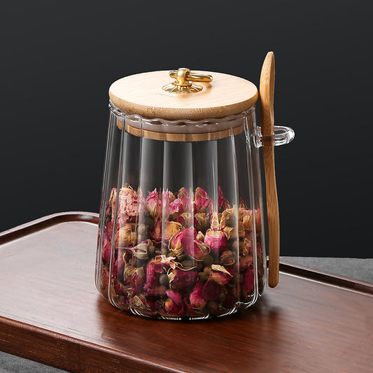 Zylindrischer Glasbehälter mit Holzdeckel & Löffel